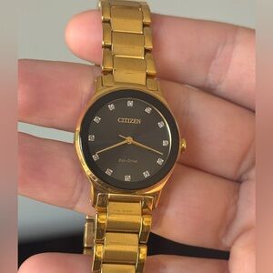 Citizen Eco-Drive Women's Gold-Tone Stainless Steel Watch EM0737-58E